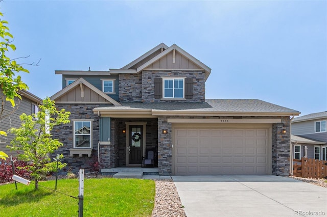9350 Dunraven St, Arvada, CO 80007 - craftsman house with board and batten siding, driveway, stone siding, and an attached garage