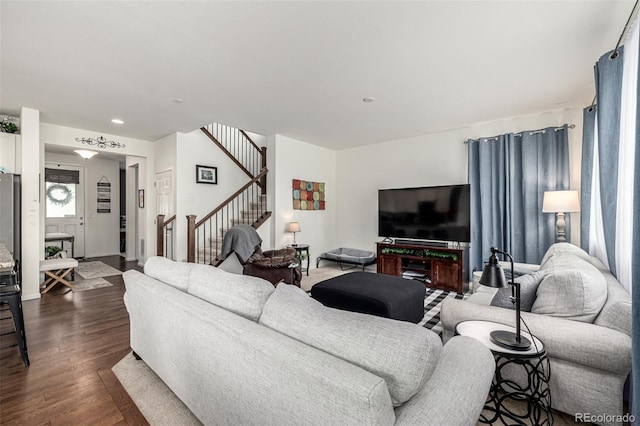 9350 Dunraven St, Arvada, CO 80007 - living room featuring stairway, dark wood-style flooring, and recessed lighting