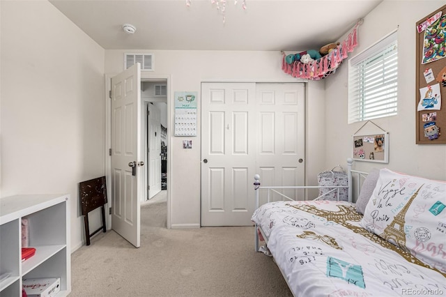 9350 Dunraven St, Arvada, CO 80007 - bedroom featuring light carpet and a closet