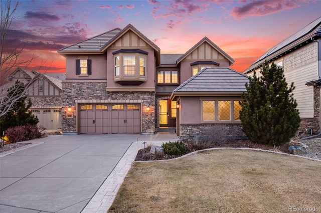 view of front of property with a garage