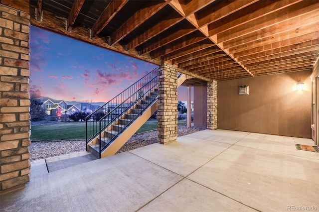 view of patio terrace at dusk