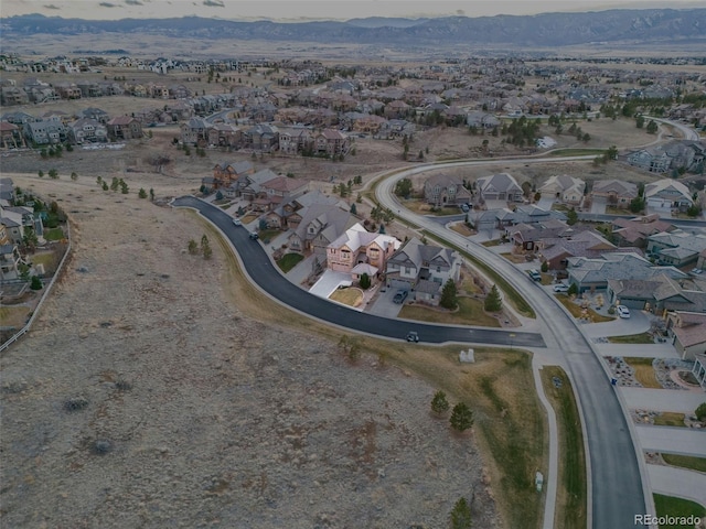 drone / aerial view featuring a mountain view