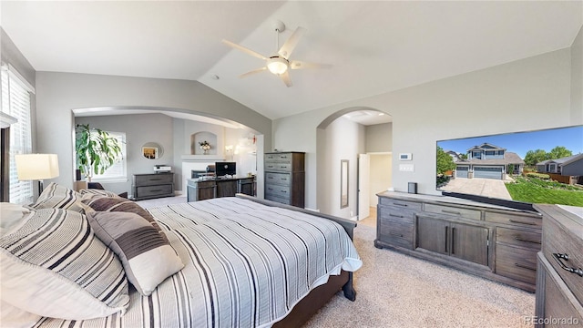 4826 S Ireland St, Aurora, CO 80015 - bedroom featuring arched walkways, vaulted ceiling, light carpet, and ceiling fan