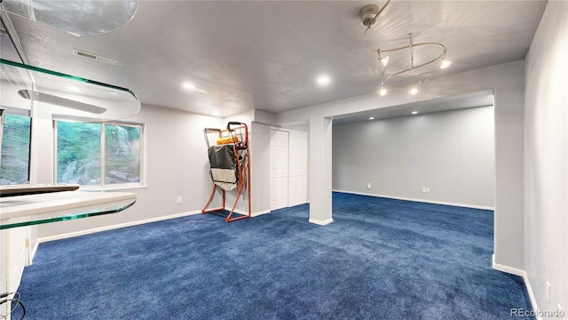 4826 S Ireland St, Aurora, CO 80015 - below grade area with dark carpet, baseboards, and recessed lighting