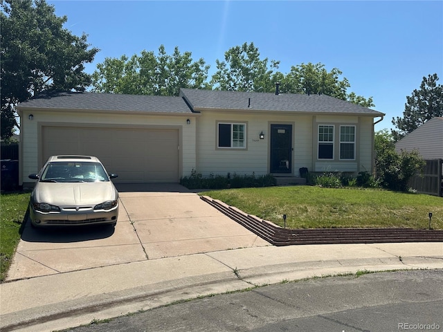 19645 E Buchanan Pl, Aurora, CO 80011 - ranch-style house with concrete driveway, a front lawn, and an attached garage
