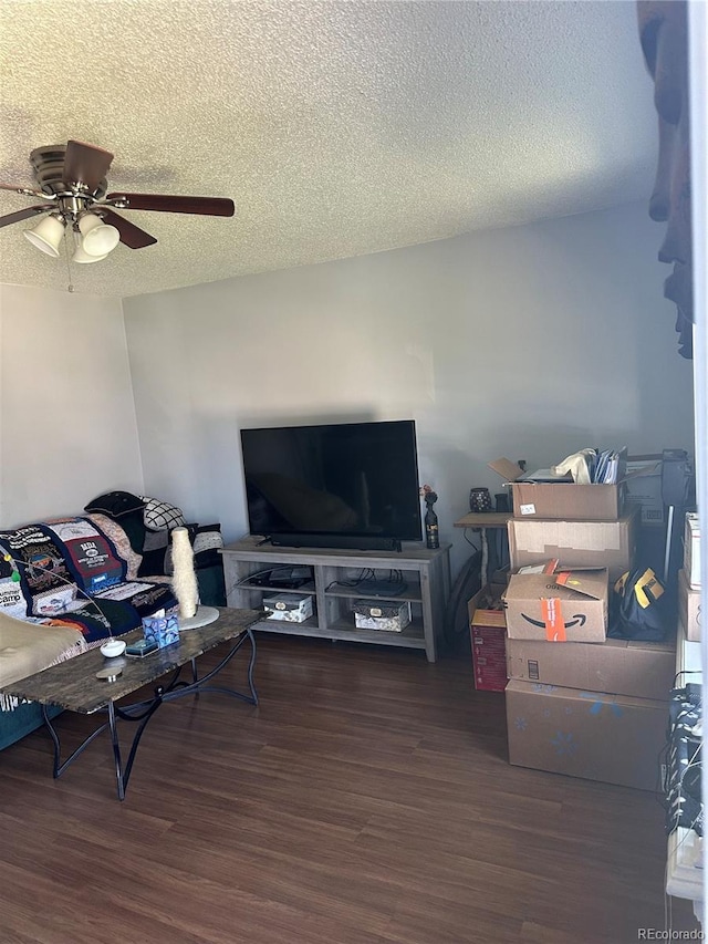 19645 E Buchanan Pl, Aurora, CO 80011 - living room featuring a textured ceiling, wood finished floors, and ceiling fan