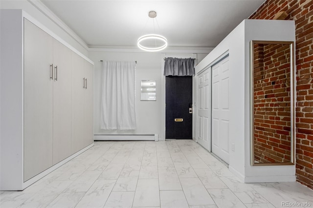 foyer entrance with baseboard heating