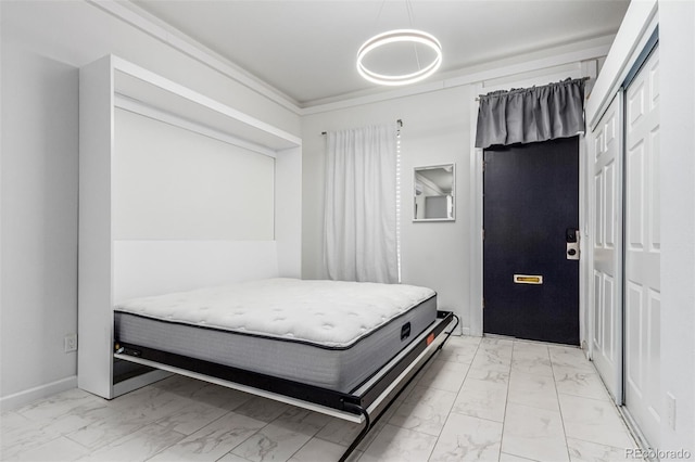 bedroom with crown molding