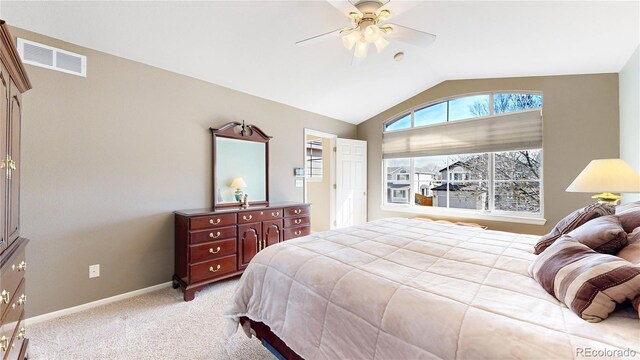 bedroom with light carpet, baseboards, visible vents, lofted ceiling, and ceiling fan