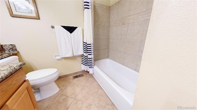 full bath with visible vents, toilet, vanity, tile patterned flooring, and baseboards