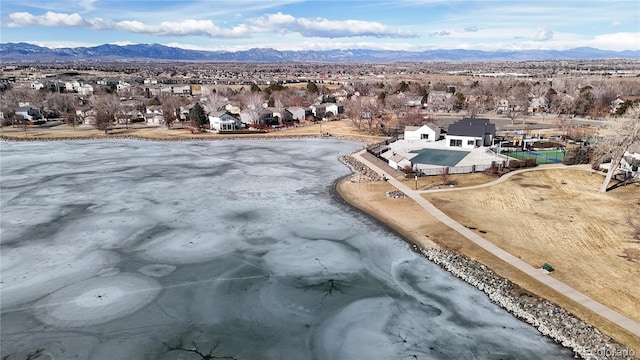 aerial view with a residential view and a water and mountain view