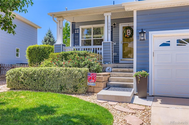 1201 Trout Creek Cir, Longmont, CO 80504 - view of exterior entry featuring a porch