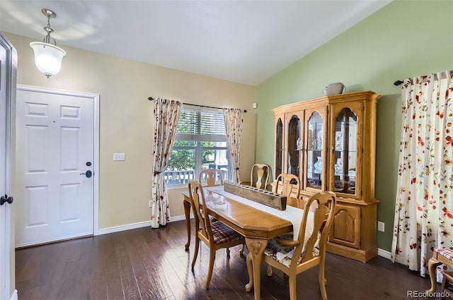 1201 Trout Creek Cir, Longmont, CO 80504 - dining area featuring vaulted ceiling and dark wood-style flooring