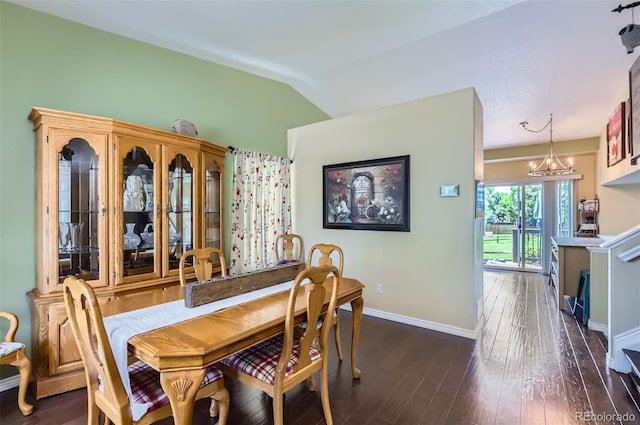 1201 Trout Creek Cir, Longmont, CO 80504 - dining space featuring dark wood-style flooring, a chandelier, and lofted ceiling