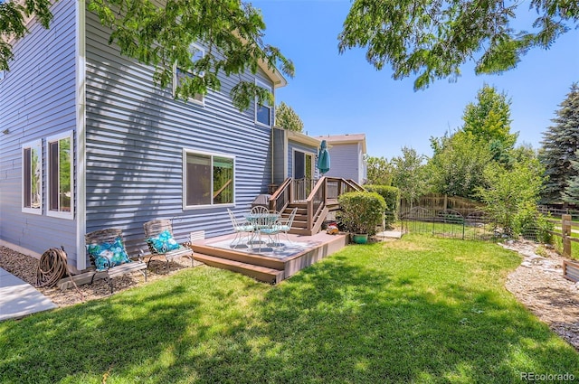 1201 Trout Creek Cir, Longmont, CO 80504 - view of yard with a wooden deck
