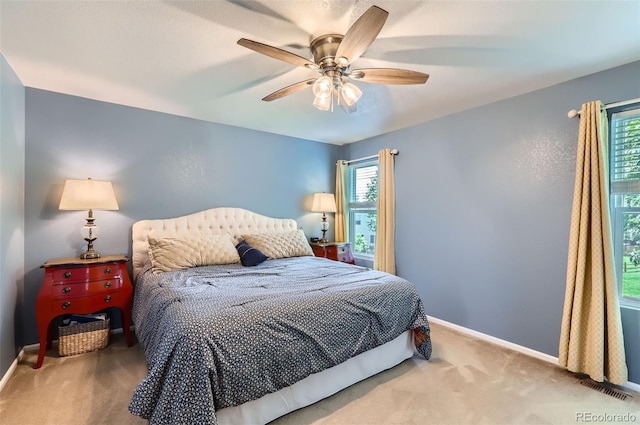 1201 Trout Creek Cir, Longmont, CO 80504 - carpeted bedroom with baseboards and ceiling fan