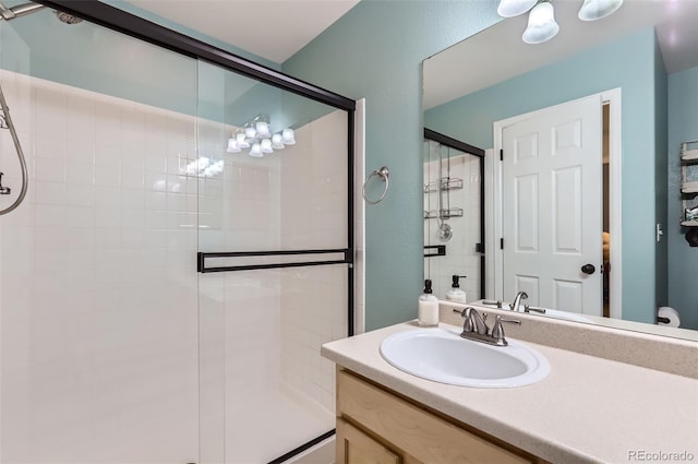 1201 Trout Creek Cir, Longmont, CO 80504 - bathroom featuring a stall shower and vanity