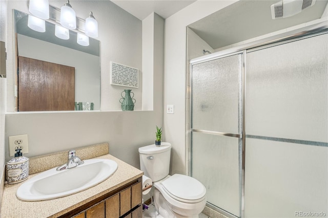 140 Forest Dr, Frisco, CO 80443 - full bath with a stall shower, toilet, and vanity