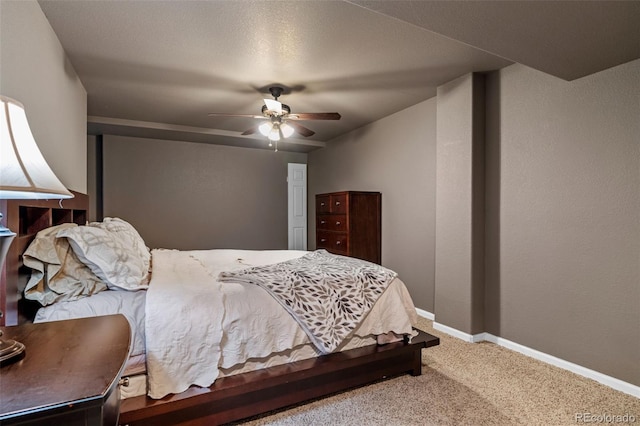 1609 S Catawba Cir, Aurora, CO 80018 - carpeted bedroom featuring baseboards and a ceiling fan