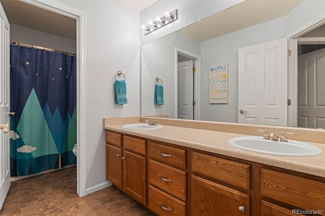 1609 S Catawba Cir, Aurora, CO 80018 - bathroom with double vanity and a shower with curtain