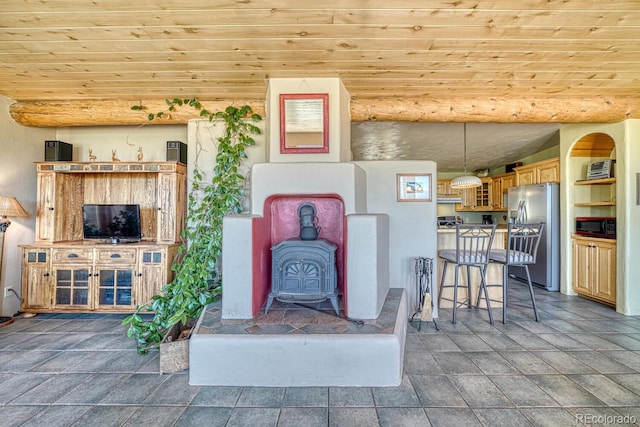 11855 County Road 251a, Salida, CO 81201 - living area featuring wooden ceiling and a wood stove