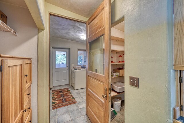 11855 County Road 251a, Salida, CO 81201 - foyer entrance with washing machine and dryer and a textured wall