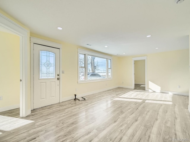 foyer entrance featuring light wood-type flooring