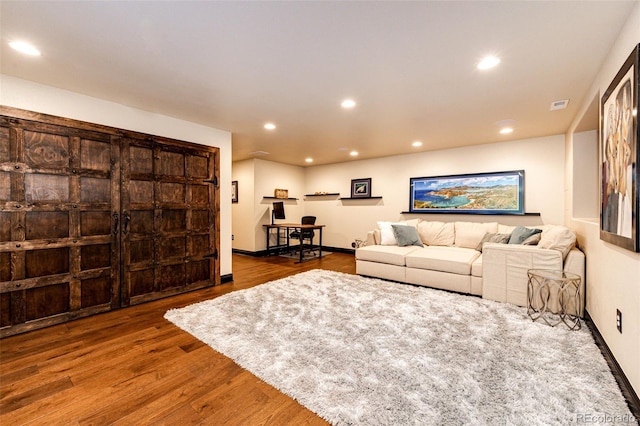 living room with hardwood / wood-style flooring