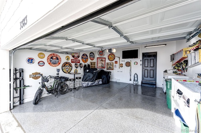 garage featuring a garage door opener