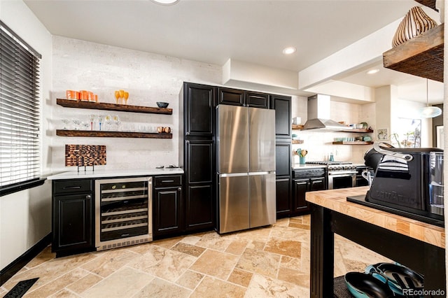 kitchen featuring stainless steel appliances, wine cooler, dark cabinetry, and open shelves