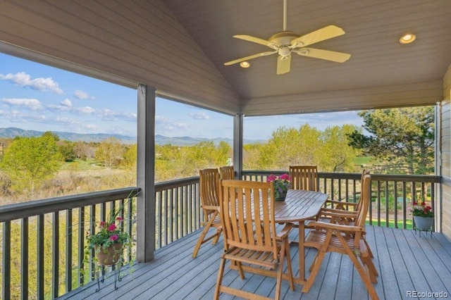 9531 Desert Willow Way, Highlands Ranch, CO 80129 - wooden deck featuring a ceiling fan, a mountain view, and outdoor dining area