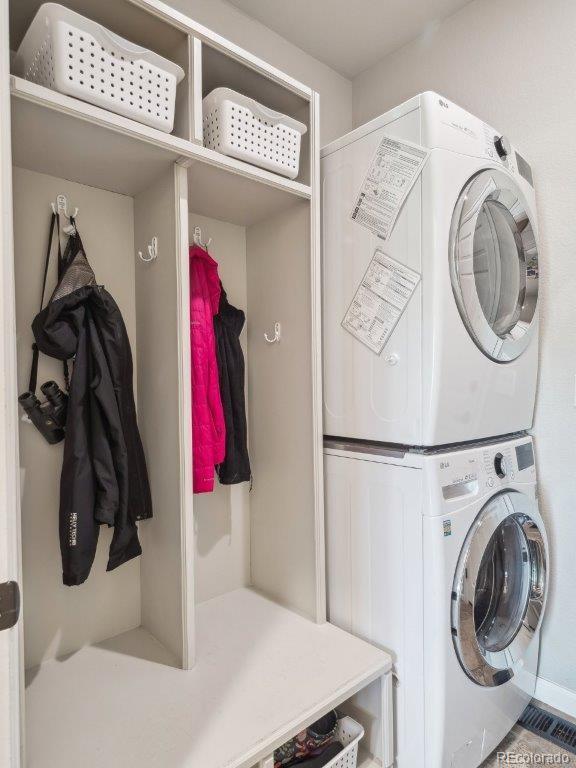 9531 Desert Willow Way, Highlands Ranch, CO 80129 - washroom with stacked washer / drying machine