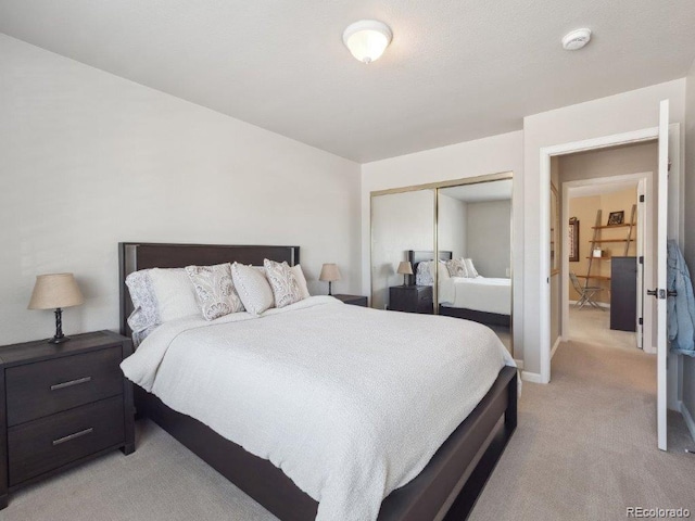 9531 Desert Willow Way, Highlands Ranch, CO 80129 - bedroom featuring light colored carpet, a closet, and baseboards