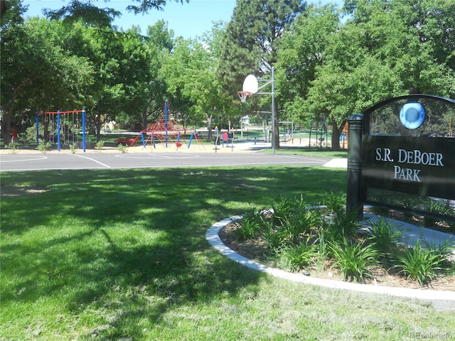 exterior space featuring a playground and a lawn