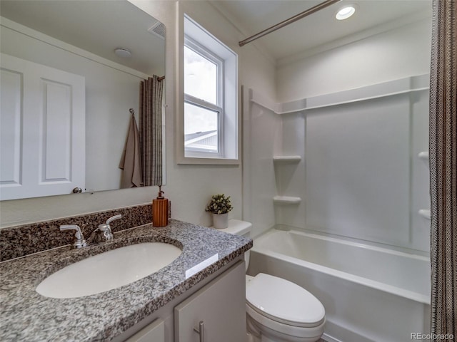 full bathroom featuring vanity, shower / bathtub combination with curtain, and toilet