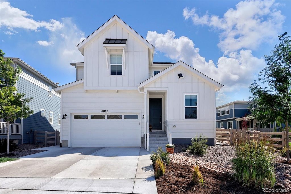 modern farmhouse style home with a garage