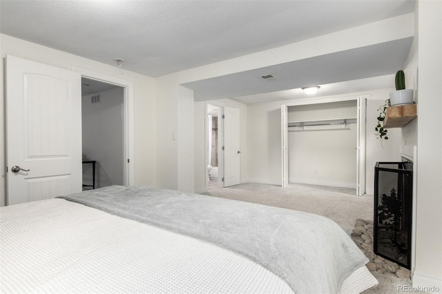 7579 Jay Ct, Arvada, CO 80003 - bedroom featuring light carpet, a closet, and baseboards