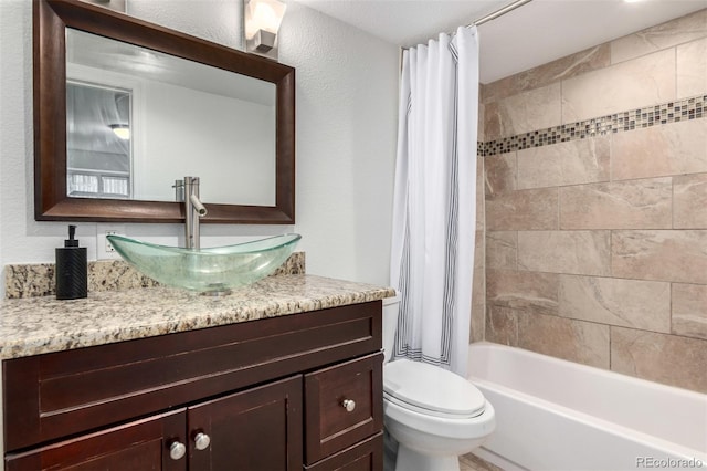 7579 Jay Ct, Arvada, CO 80003 - bathroom with vanity, toilet, and shower / bath combo