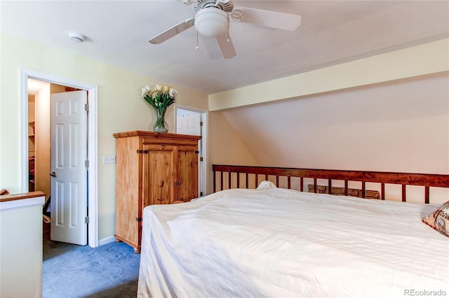 bedroom with carpet flooring, vaulted ceiling, and ceiling fan