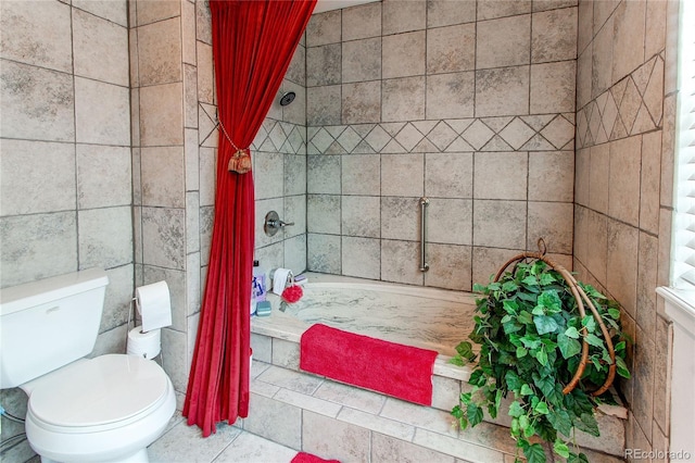 bathroom featuring toilet and tiled shower / bath