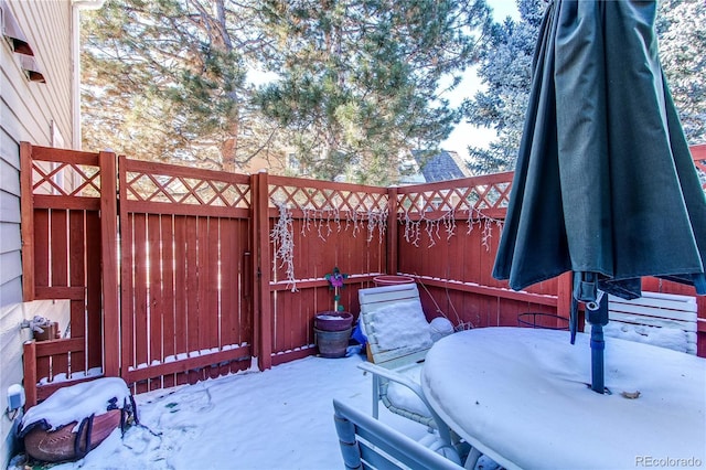 view of snow covered patio