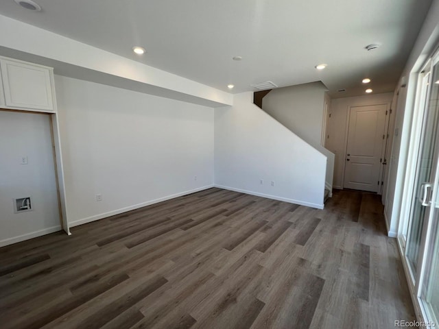 6658 N Nepal Ct, Aurora, CO 80019 - below grade area with wood finished floors, baseboards, and recessed lighting