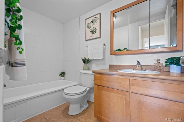 full bathroom with shower / tub combination, tile patterned flooring, vanity, and toilet