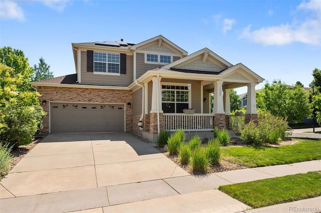 13322 Meadow Park Ln, Broomfield, CO 80020 - craftsman inspired home featuring covered porch, driveway, an attached garage, and solar panels