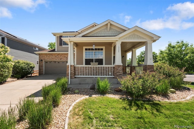 13322 Meadow Park Ln, Broomfield, CO 80020 - craftsman house featuring covered porch, driveway, and stone siding