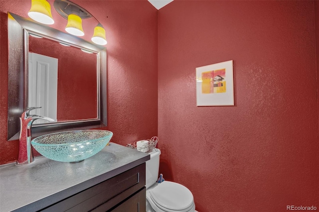 13322 Meadow Park Ln, Broomfield, CO 80020 - half bath with vanity and a textured wall