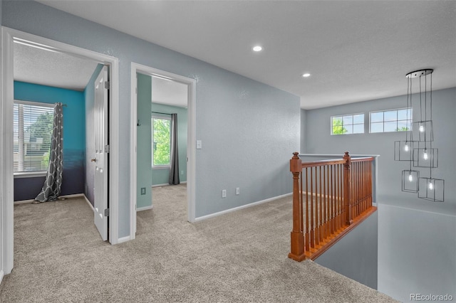 13322 Meadow Park Ln, Broomfield, CO 80020 - corridor with an upstairs landing, plenty of natural light, carpet, and recessed lighting