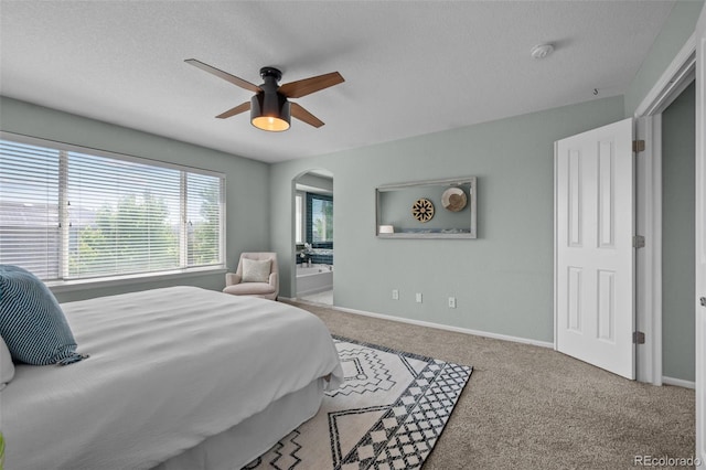 13322 Meadow Park Ln, Broomfield, CO 80020 - carpeted bedroom with arched walkways, ceiling fan, and a textured ceiling