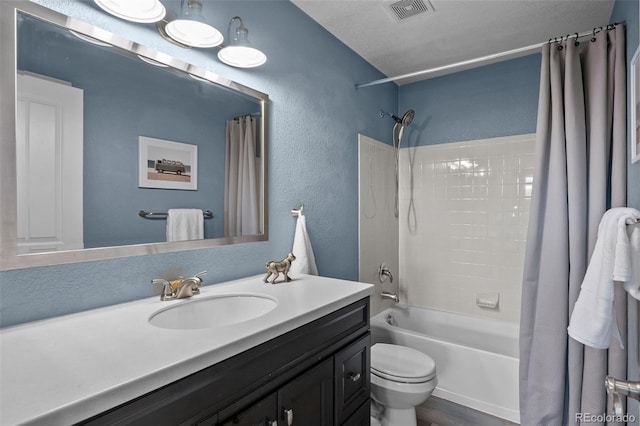13322 Meadow Park Ln, Broomfield, CO 80020 - full bath featuring vanity, shower / bath combo with shower curtain, and a textured wall