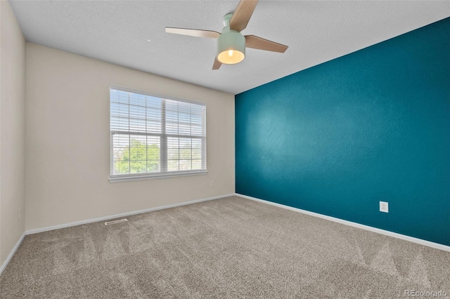 13322 Meadow Park Ln, Broomfield, CO 80020 - carpeted spare room with a ceiling fan and a textured ceiling